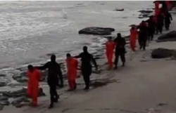 ISIS walks Christians to their execution.